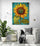 Sunflower wall art illuminating a reading corner, harmonizing with the comfortable white chair