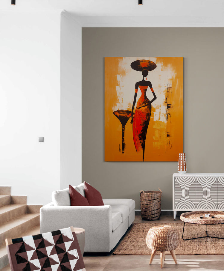 Dans un salon minimaliste, ce tableau africain devient le point focal, ses couleurs chaudes se mêlant harmonieusement avec les tons neutres et les textures naturelles de la pièce.