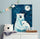 Two polar bears starry night painting displayed in a kids' room with garlands and a plush teddy bear