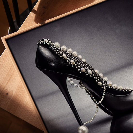 Black and white beaded stiletto wall art for minimalist office decor