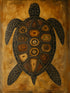 Large tribal turtle painting in a bright hallway with arches, wooden furniture, and decorative plants. The setting highlights the authentic and natural aspect of the artwork.