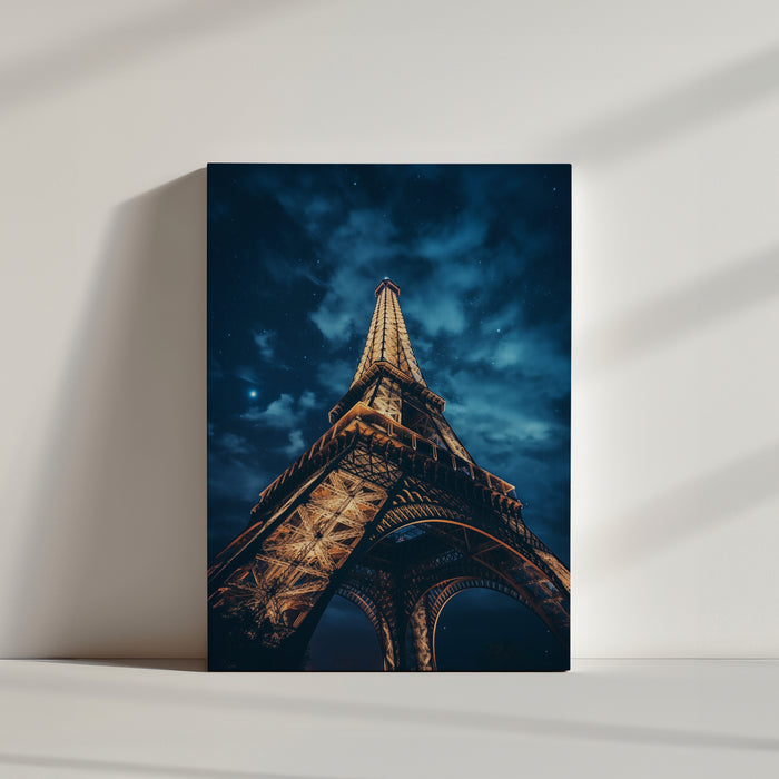 Eiffel Tower night photo under a starry sky, bathed in golden light against deep blue night tones