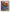 Tableau de tournesols vibrants dans un vase turquoise avec des oranges, style impressionniste