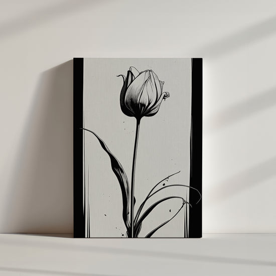 Minimalist black ink tulip illustration on a light background, fluid lines, curved leaves, and artistic ink splatters