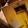 Yellow vintage bicycle wall art for a minimalist office