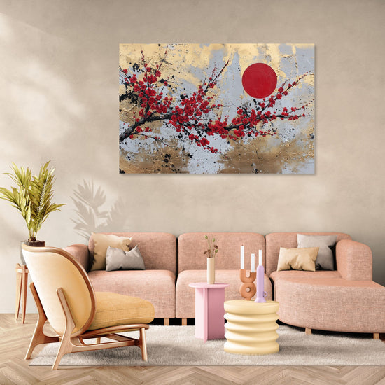 Tableau abstrait fleuri avec branches rouges sur fond doré, style zen, dans un salon moderne et pastel