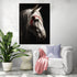 Painting of a white horse with red paint, soft and modern vibe with white armchair and green plant