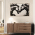 Decorative artwork of two horses in black and white, expressive style in a contemporary living room.