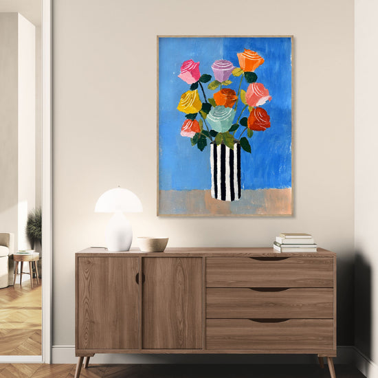 Colorful floral painting with a striped vase on a blue background, modern and calming wall art