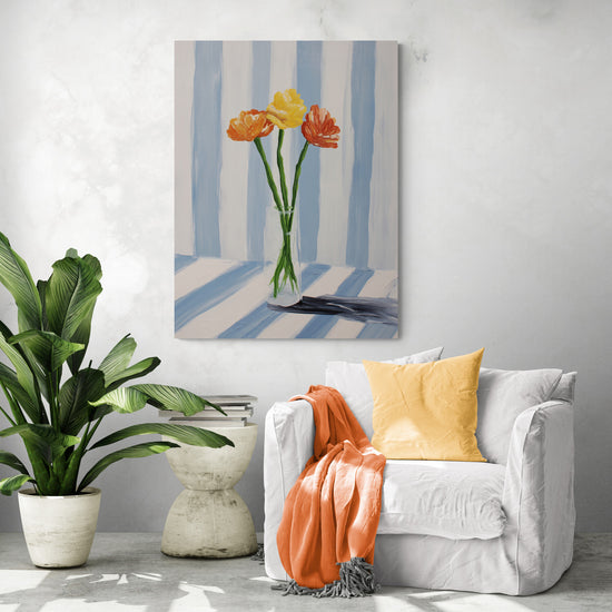 Vivid floral art on blue and white striped background, bold in a chic living room