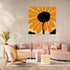Modern floral wall art with vivid orange petals, styled in a soft pastel-toned living room