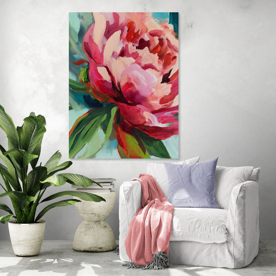 Vibrant floral artwork with pink peonies in a bright, modern living room