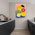 Vibrant citrus wall art with pink background, ideal for a bright modern kitchen