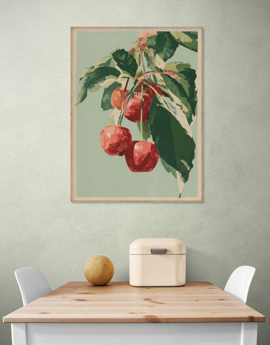 Wall art with red cherries and green foliage on a green background, rustic and natural ambiance in the dining room