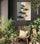 Floating Zen stones wall art in natural tones for a relaxing atmosphere in a plant-filled interior