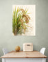 Wall art of green plants and rice ears, watercolor style, natural ambiance in a neutral-toned dining room