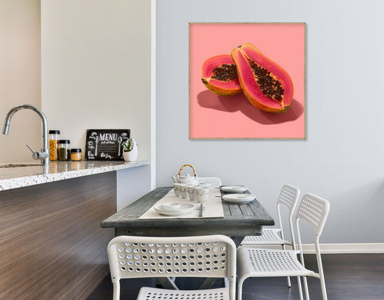 Pink papaya Pop Art wall art on pink background styled in a modern kitchen