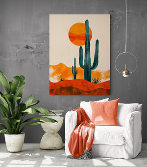 Artistic image of a cactus, hung above a white sofa, lit by a modern pendant light.