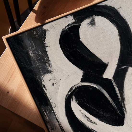 Black and white abstract embrace canvas art for a minimalist living room