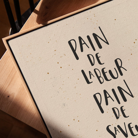 Citation typographique pain toile pour salon cadre chêne doré