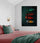 Primary bedroom with double bed, red sheets and green throw, nightstand, boats wall art