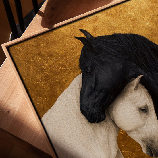 Black and white horse wall art with a gold background for a minimalist living room