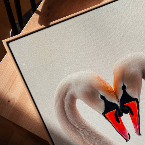 Romantic swans canvas wall art for the living room with a golden oak frame