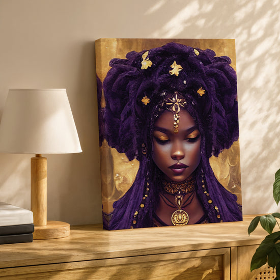 Black and gold goddess canvas wall art for living room decor, shown above an oak sideboard with a lamp