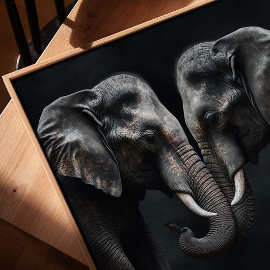 Elephants hugging wall art for a minimalist office