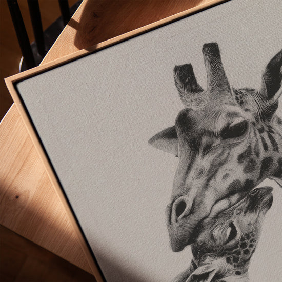 Mother and baby giraffe canvas print for the living room, golden oak frame