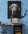 Personalized dog portrait wall art hanging in an office