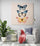 A print of three colorful butterflies gracing a modern zen living room.