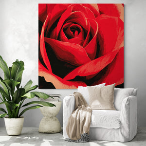 Large red rose wall art in a modern living room with a white chair and green plant, adding a touch of love and romance