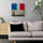 Banksy-inspired street art canvas on a living room wall: young girl before the French flag, evoking strength, hope, and determination