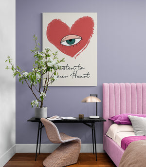 a decorative canvas with a red heart for teen room