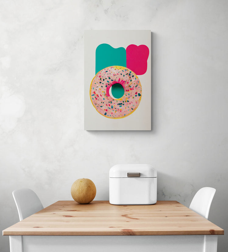 Toile déco, sur le mur d'une cuisine d'un donut dessiné à la main. Crème de couleur rose et est parsemée de pépites multicolores. L'arrière-plan du tableau est composé de deux traces de peinture, un beau rouge et l'autre verte, qui ajoutent de la profondeur et de la dimension à l'ensemble. Le tableau est très esthétique et aux couleurs vives. Minimaliste, ce tableau dégage une touche de fraîcheur et de féminité combinée au donut qui ajoute vie et gourmandise. Le cadre de taille moyenne