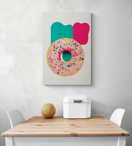 Grande déco mural dans une cuisine d'un donut dessiné à la main. Crème de couleur rose et est parsemée de pépites multicolores. L'arrière-plan du tableau est composé de deux traces de peinture, un beau rouge et l'autre verte, qui ajoutent de la profondeur et de la dimension à l'ensemble. Le tableau est très esthétique et aux couleurs vives. Minimaliste, ce tableau dégage une touche de fraîcheur et de féminité combinée au donut qui ajoute vie et gourmandise