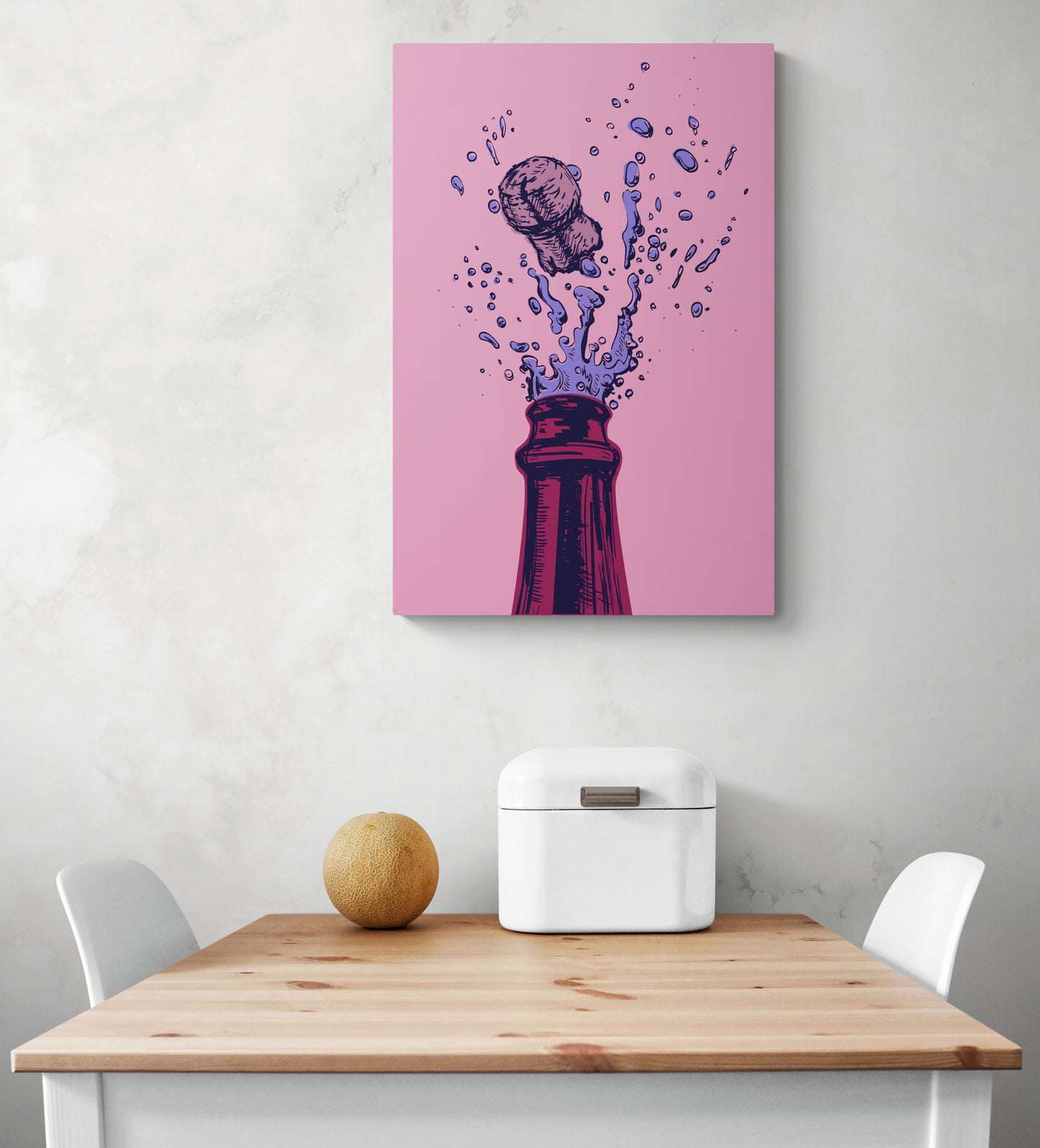 un tableau toile pour cuisine rose est accroché au-dessus d'une table de raps en bo