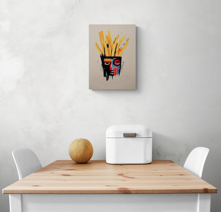 Inspiré de Basquiat, petit tableau d'art design dans une cuisine qui représente le visage d'un afro-américain avec des cheveux en frite. Minimalistes et colorées, ses couleurs sont vives et profondes. Les couleurs principales sont le jaune, le rouge, le noir et le beige