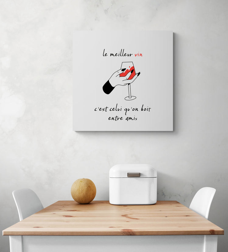 cadre deco citation avec un dessin à plats d'un verre de vin dans une main féminine et une citation: le meilleur vin c'est celui qu'on boit entre amis 