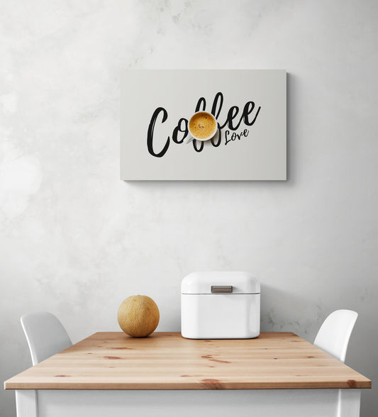 Un tableau minimaliste blanc avec une tasse de café est accroché sur le mur d'une cuisine blanche