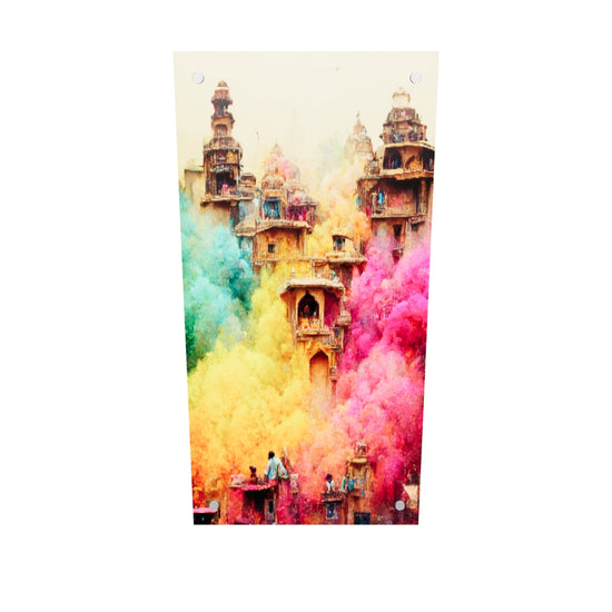 Tableau plexiglass de Holi, une fête indienne. Une ville d'Inde s'anime sous un nuage de pigments aux couleurs vives, de poussières et de fumée, créant un décor féerique digne d'un conte de fées. Ici trois couleurs principales sont à l'honneur, le jaune, le rose et le bleu turquoise. Le tableau est de taille moyenne