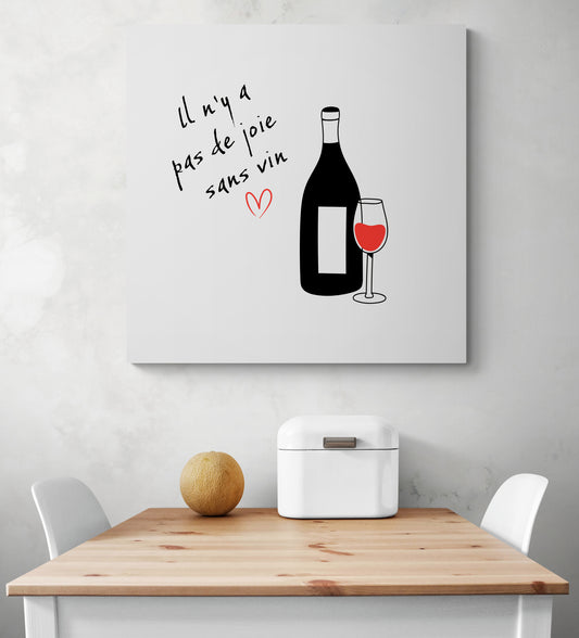 un tableau cuisine blanc avec une illustration d'une bouteille de vin et une citation est accrochée sur un mur blanc.
