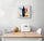 Modern kitchen wall art with a wine bottle and geometric shapes